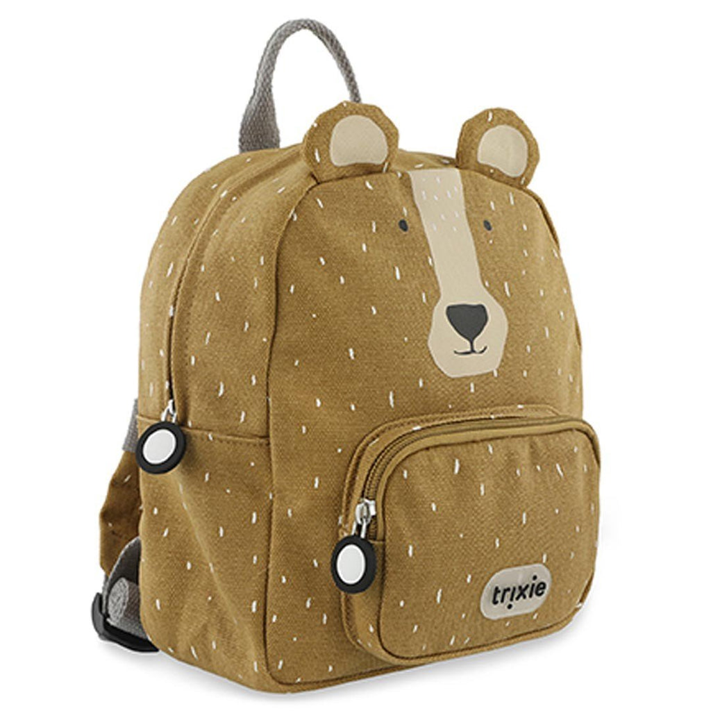 2. Side view of Trixie Baby Mr. Bear small backpack showing bear face design and side pocket