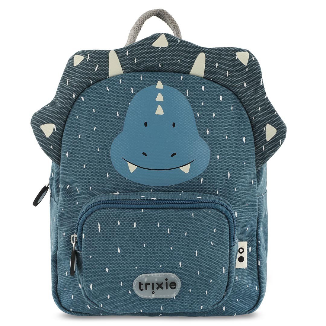 2. Front view of Trixie Baby's Mr. Triceratops small backpack in blue with dinosaur face and horn details, featuring a front pocket and brand logo