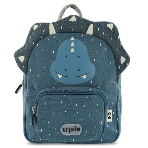 2. Front view of Trixie Baby's Mr. Triceratops small backpack in blue with dinosaur face and horn details, featuring a front pocket and brand logo