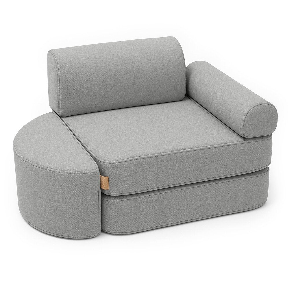 1. Fog gray children's modular sofa with semicircular footstool, armrest, and headrest in studio setting