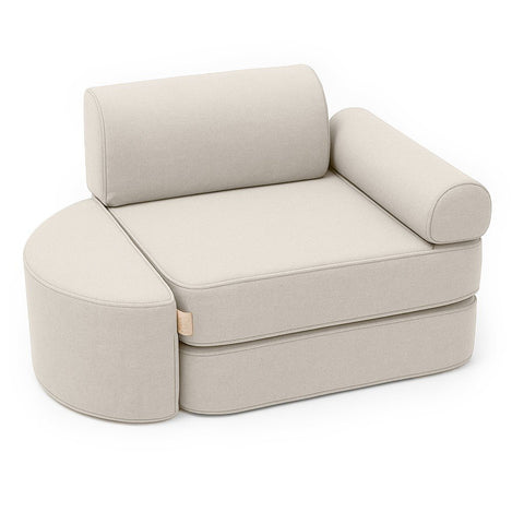 1. Beige modular children's sofa with armrest and semicircular footstool on white background