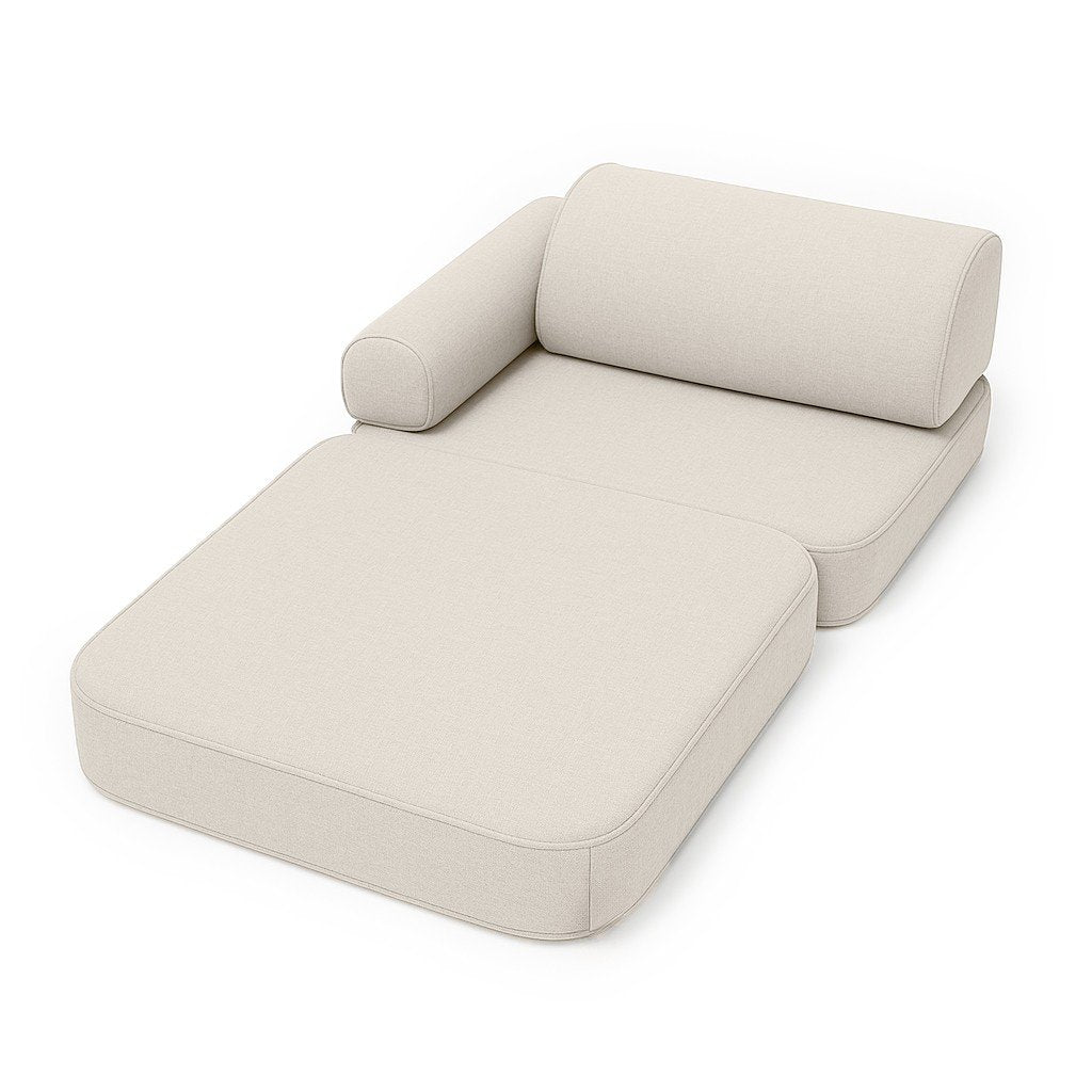 2. Beige children's sofa arranged as a lounger with armrest on white background