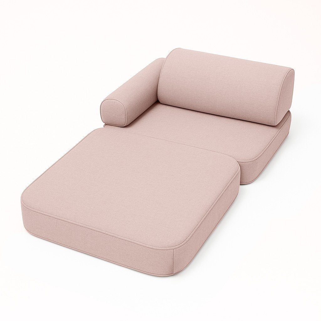 2. Rosy dune pink children's sofa arranged as a lounger with armrest on white background