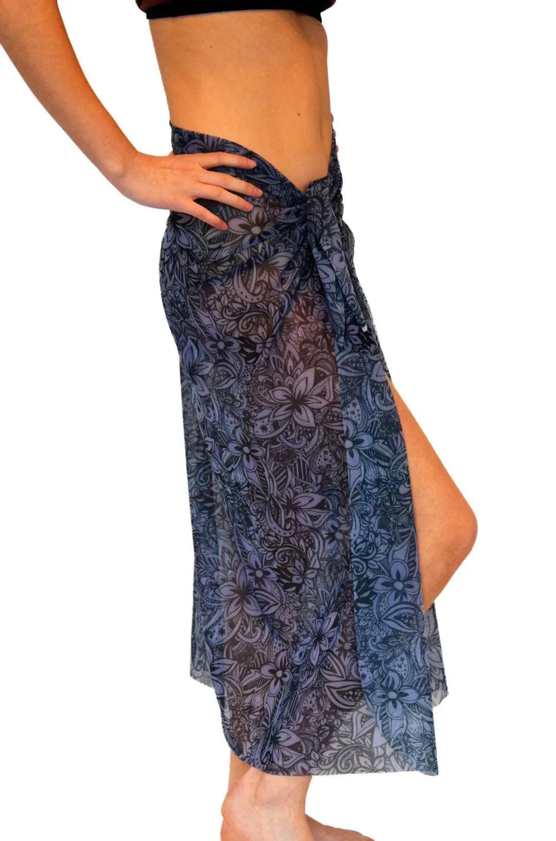 1. Women's Moonlight Tropics Tan Through Sarong by Smarttan, featuring high-contrast floral print, shown in side view.