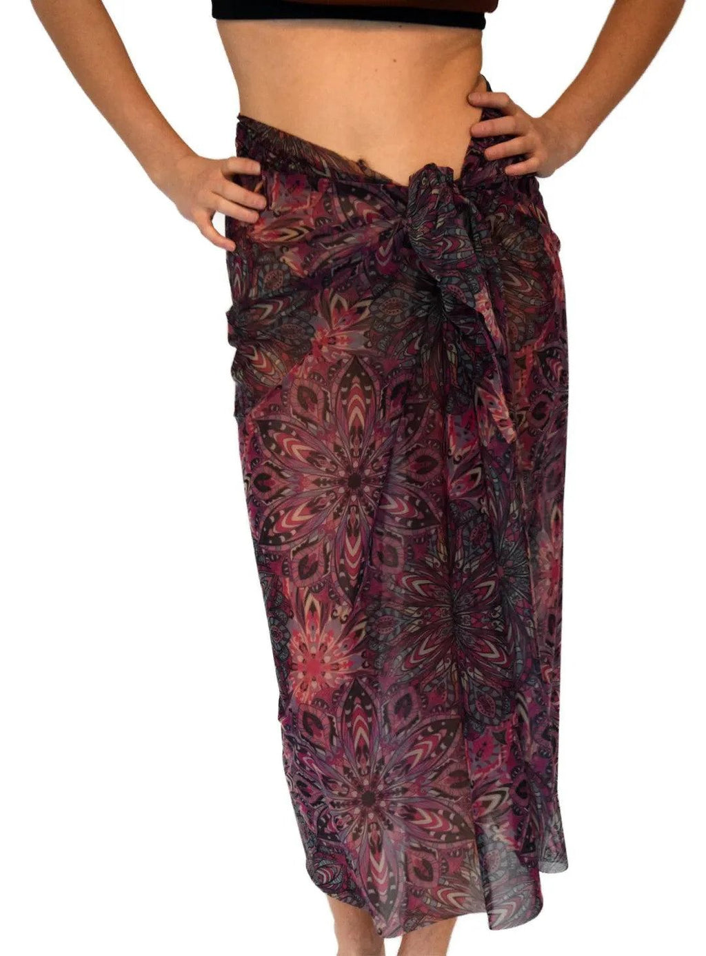 3. Close-up of Smarttan Terracotta Mandala Tan Through Sarong tied at waist, showing detailed mandala design and sheer material