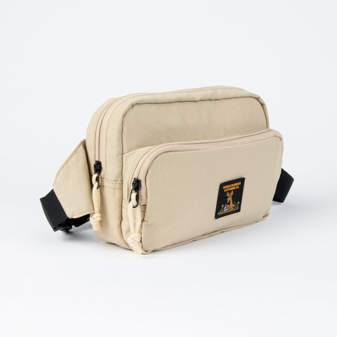 2. Side angle of beige Sniff Retro Waist Bag by Moomin NordicBuddies with dual front pockets