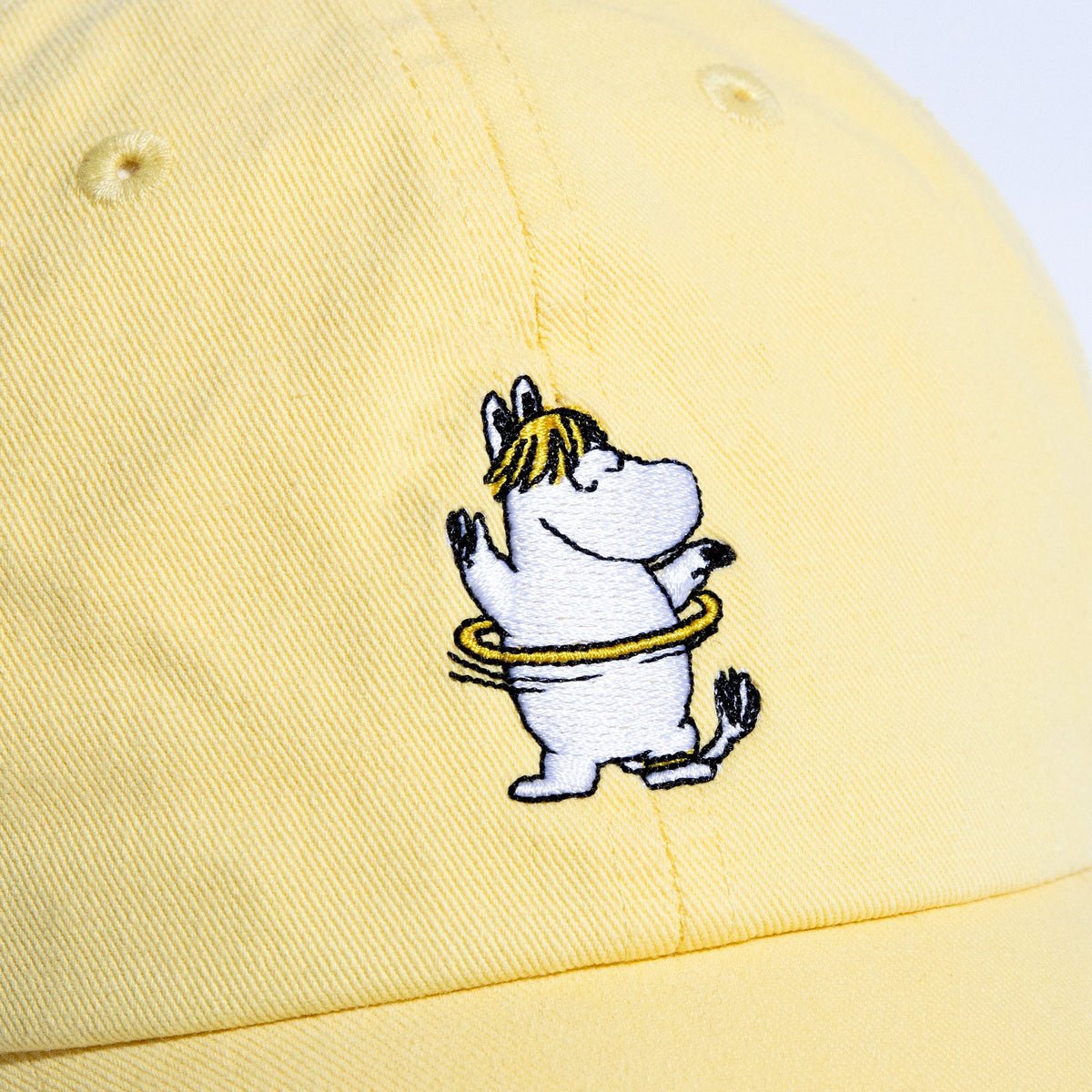 4. Close-up of Snorkmaiden embroidery on yellow Moomin by NordicBuddies Dad Cap