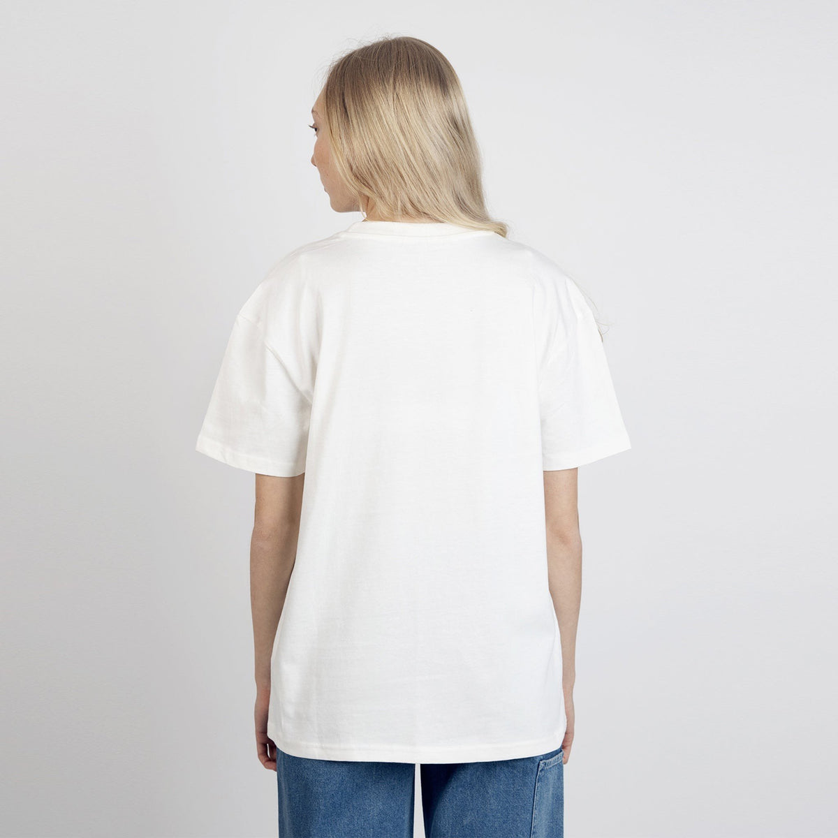 4. Back view of women's Snufkin Fishing T-Shirt by Moomin in white, worn by female model