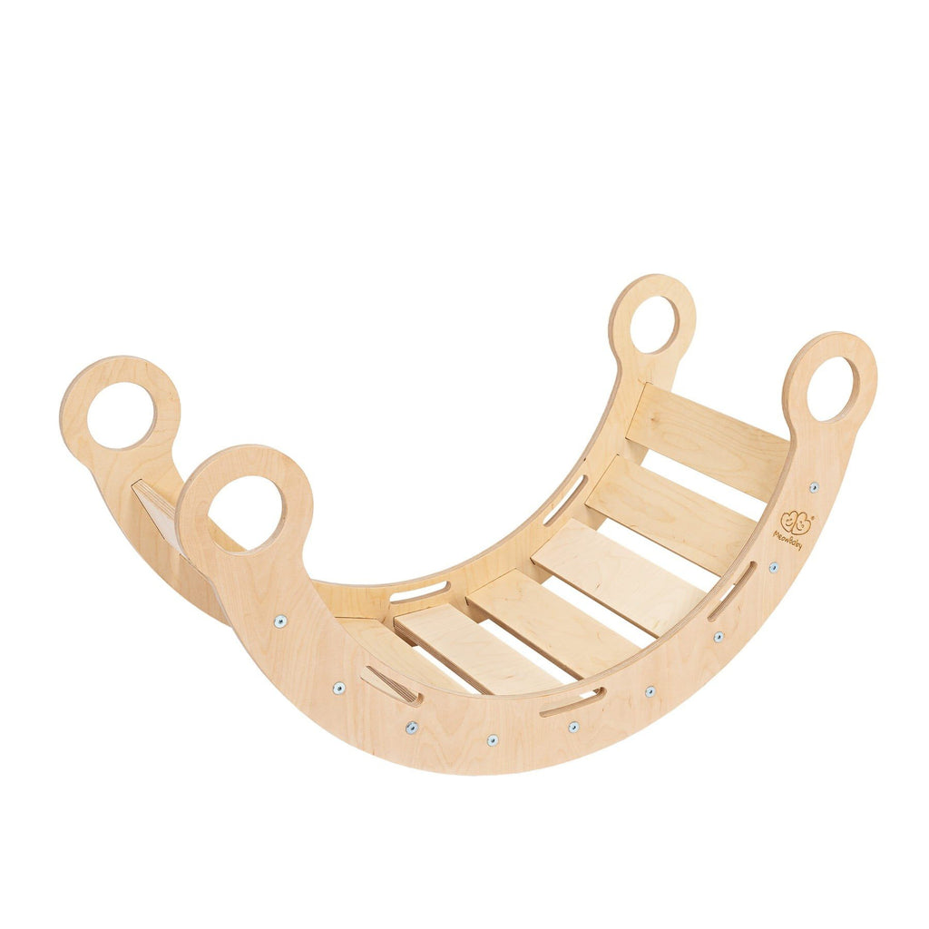 4. Angled view of Snug Rocker for kids in natural birch plywood, emphasizing slatted design and rounded handles