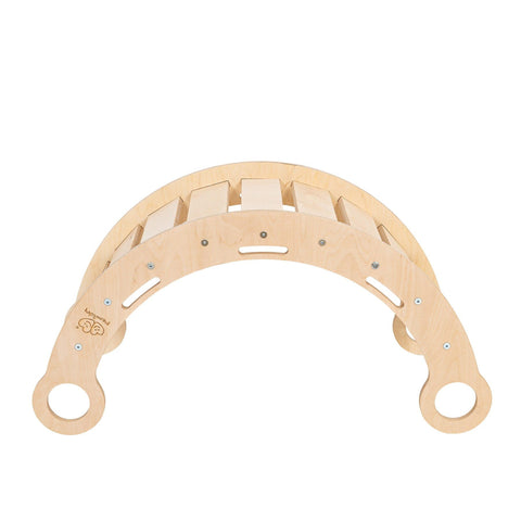2. Snug Rocker for kids in natural birch plywood, side view highlighting ladder-like structure and rounded handles