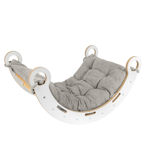 1. Snug Rocker for kids with tan beige pillow on white background, showcasing rounded edges and comfy handles