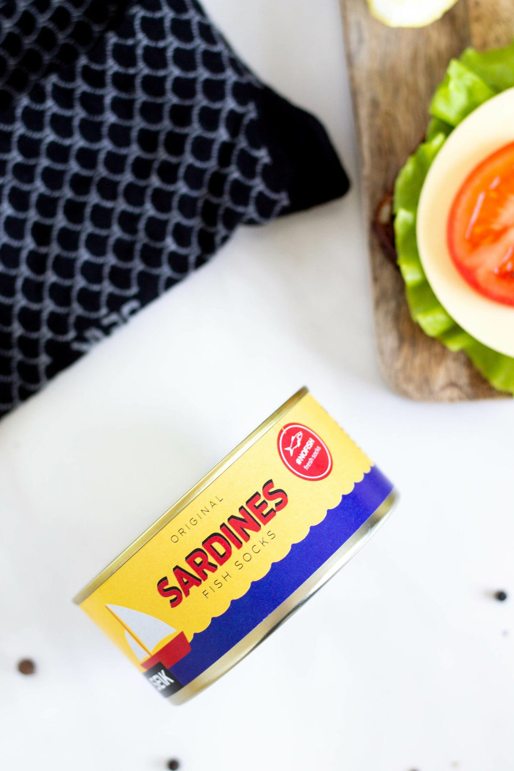 3. SEIK Sardines socks in sardine can packaging, highlighting original fish socks branding