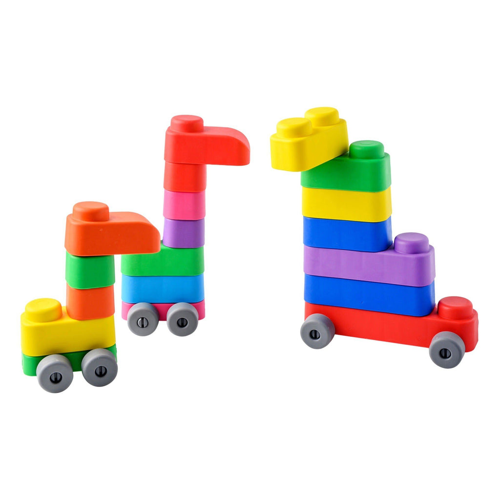9. Studio shot of colorful soft blocks assembled into larger vehicles with wheels