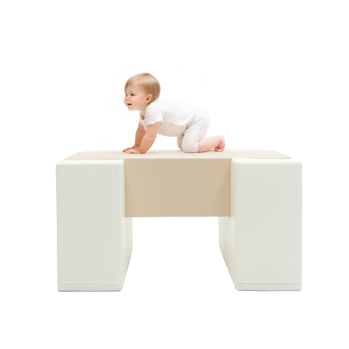 1. Child crawling on IGLU beige soft play balance bridge in a studio setting
