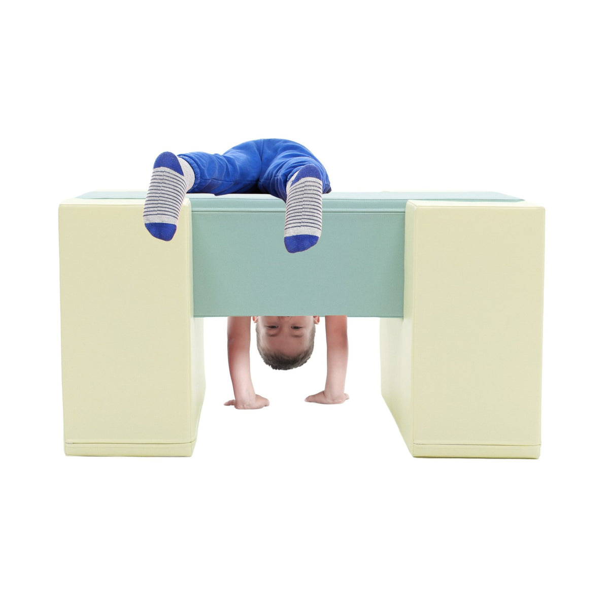 1. Child playing on IGLU Soft Play Balance Bridge in light pastel colors, demonstrating imaginative play and balance skills