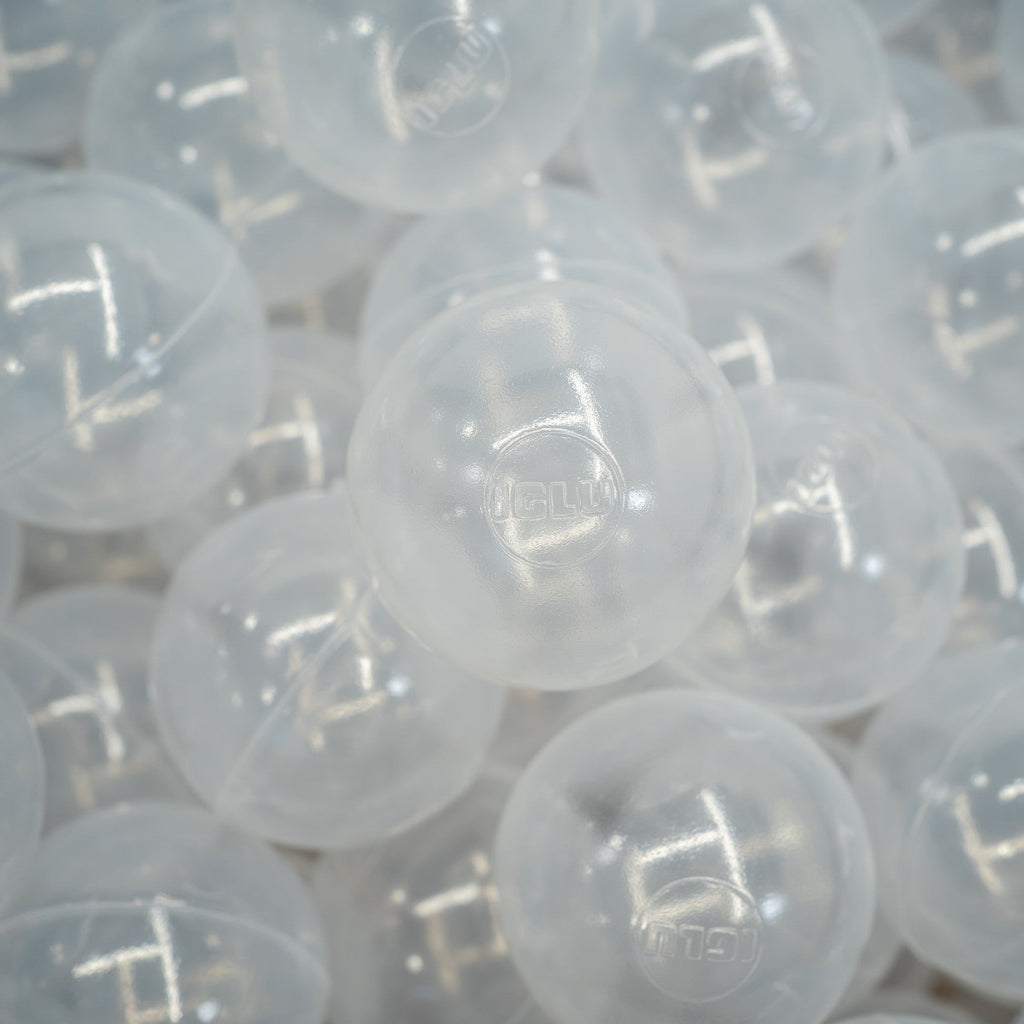 1. Close-up of translucent IGLU soft play ball pit balls with logo, showing smooth texture and durable design