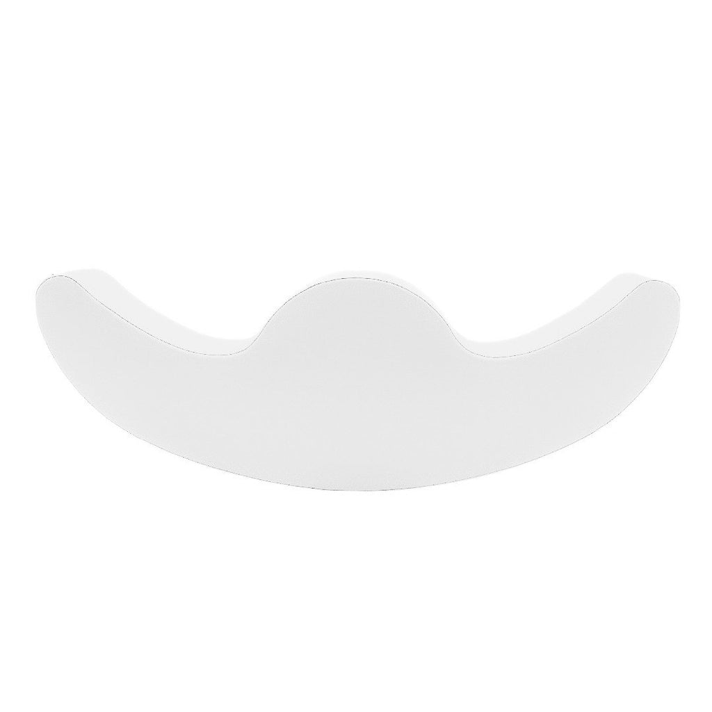 2. White soft play double rocker by IGLU shown in studio setting highlighting its curved design