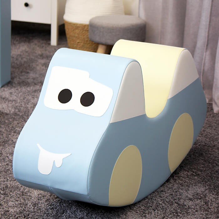 5. Light blue and cream soft play ride-on toy car with cartoon face on grey carpet
