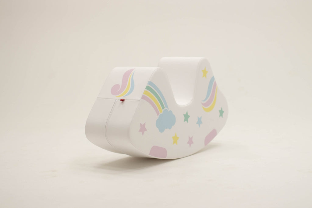 11. Back view of IGLU unicorn toy with rainbow and cloud design on white background