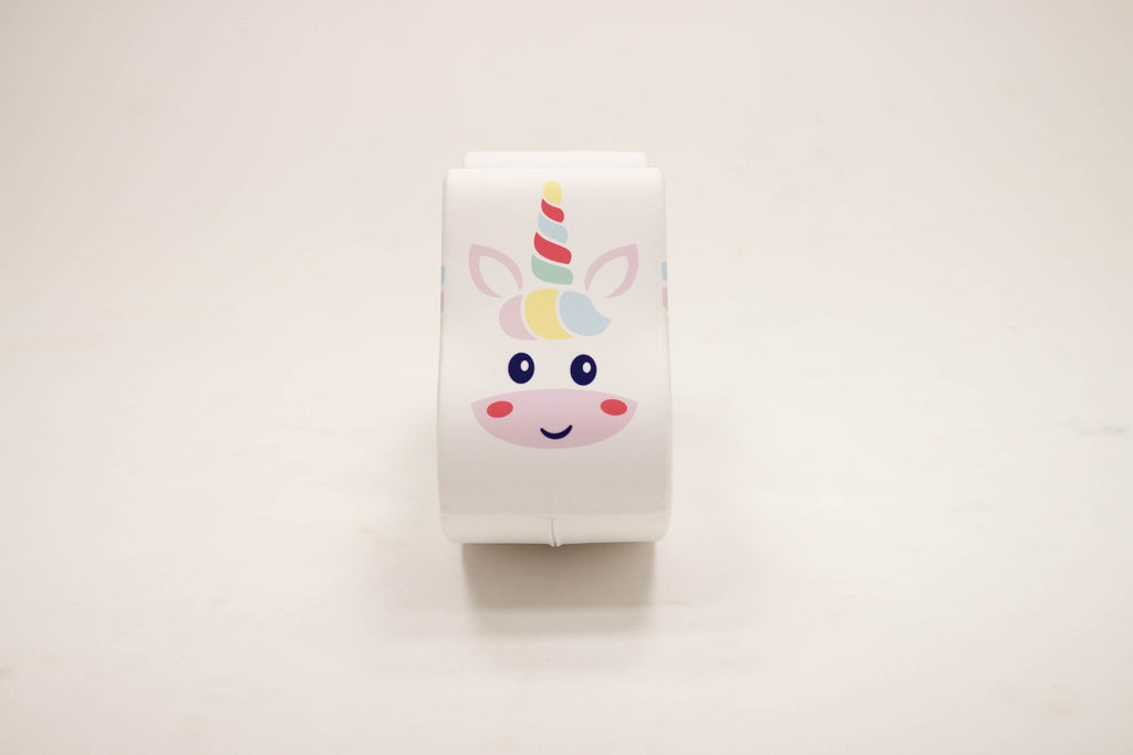 5. Front view of IGLU unicorn toy with smiling face and colorful horn on white background