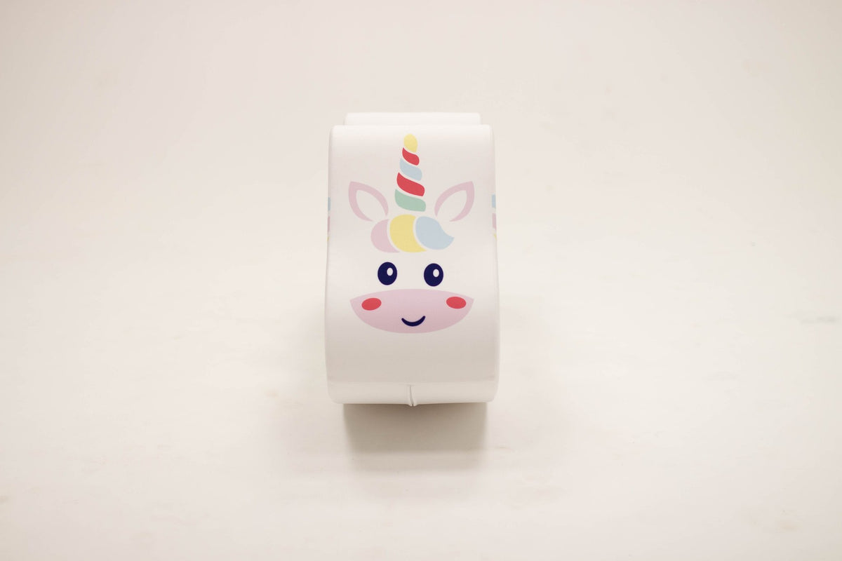 5. Front view of IGLU unicorn toy with smiling face and colorful horn on white background