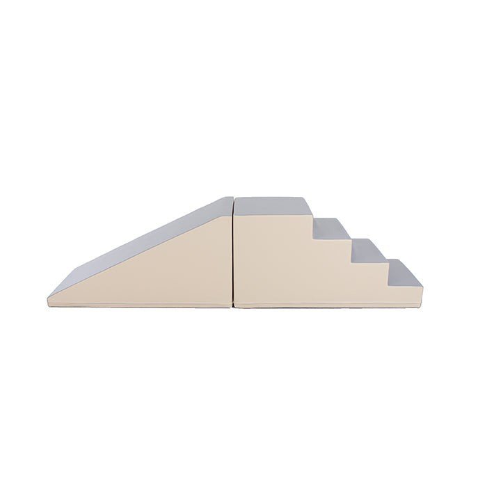 9. Beige and grey soft play step and slide set by IGLU shown from side in a studio setting