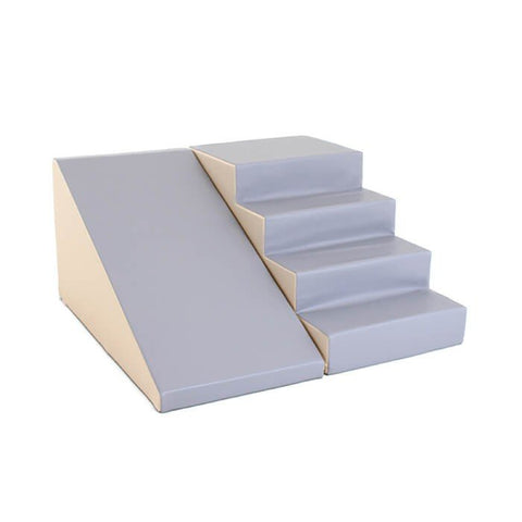 1. Beige and grey soft play step and slide set by IGLU shown in a studio setting
