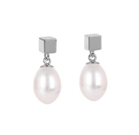 2. Studio image of MyaMoon solid pearl drop earrings in silver with freshwater pearls