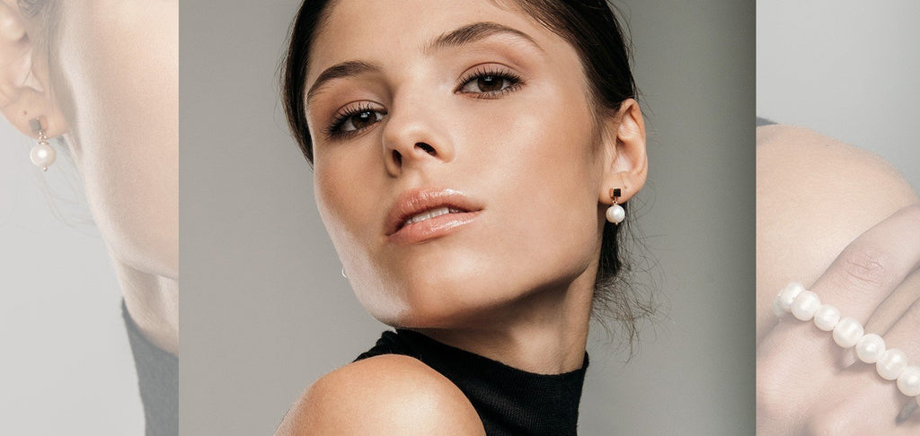 1. Women's solid pearl drop earrings in rose gold worn by model, showcasing elegant design