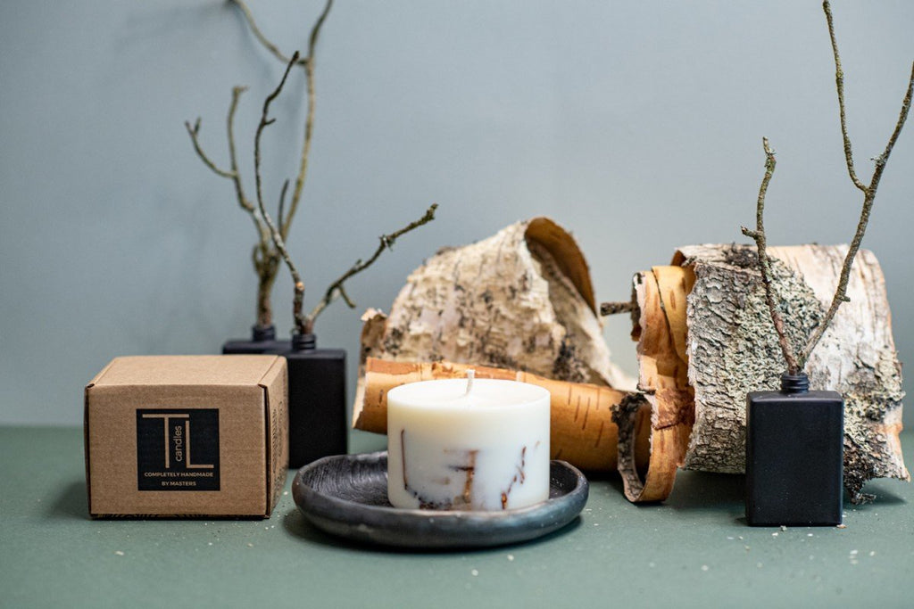 4. TL Candles soy wax candle with birch scent, featuring branded box and natural birch bark