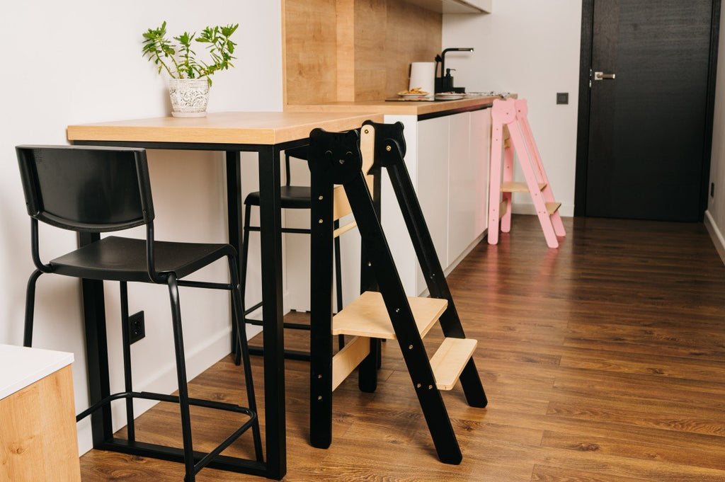 17. Black and pink step stools in modern kitchen
