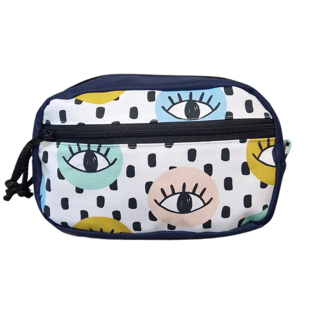 2. Front view of Drinbags waist bag featuring all-seeing eyes design on white background