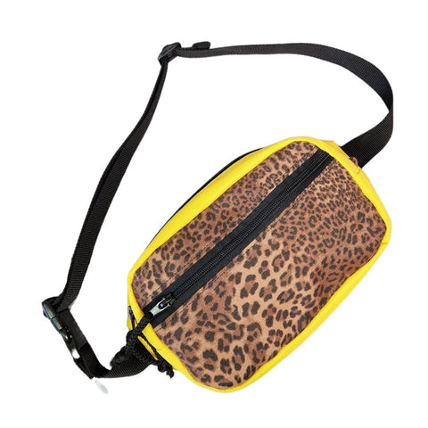 4. Angled view of yellow waist bag with leopard print front pocket and black strap