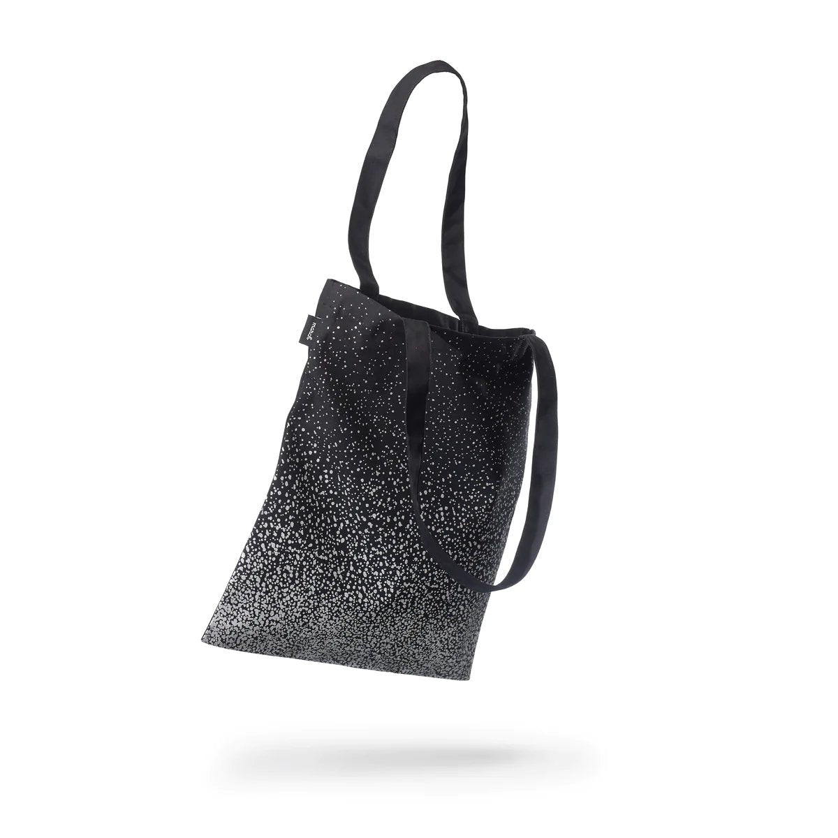 2. Studio image of MARCH Reflective Tote SPLASH with black and white reflective pattern