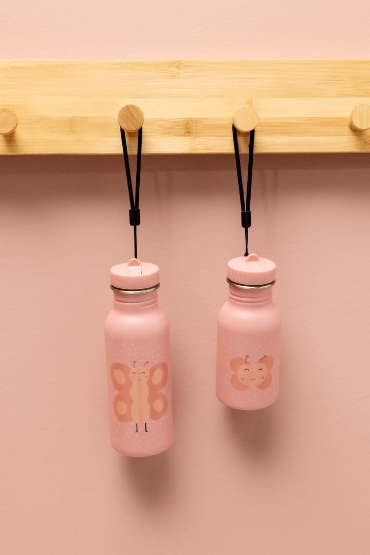 4. Two pink stainless steel bottles with butterfly designs hanging on wooden hooks