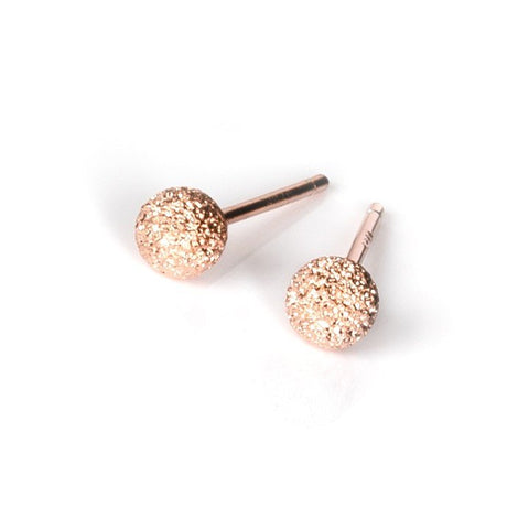 1. MyaMoon Stardust Ball Earrings in rose gold, showcasing delicate 4mm diameter and textured finish, studio shot