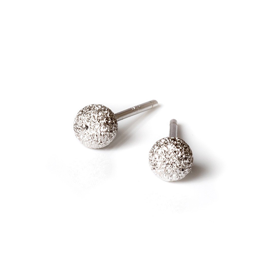 2. MyaMoon Stardust Ball Earrings in silver, featuring 4mm diameter and elegant textured design, studio shot