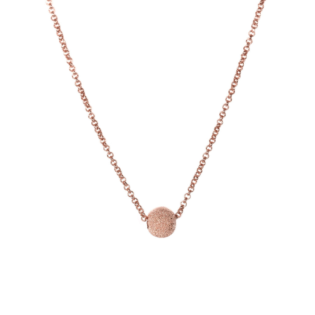 2. MyaMoon Stardust Choker in rose gold, showcasing Nordic minimalism with a round clasp and adjustable chain, studio shot
