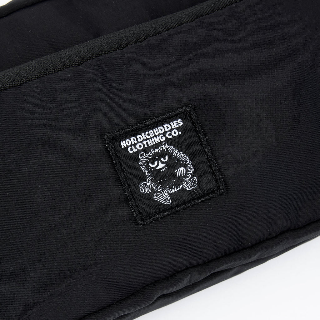 5. Close-up of NordicBuddies logo on black Stinky Retro Waist Bag by Moomin