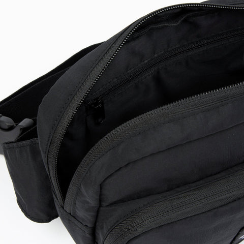 4. Interior view of black Stinky Retro Waist Bag by Moomin showing zippered pocket