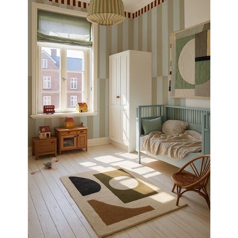 3. Bright children's room featuring blue and green striped wallpaper, wooden furniture, and geometric decor, enhancing a modern look