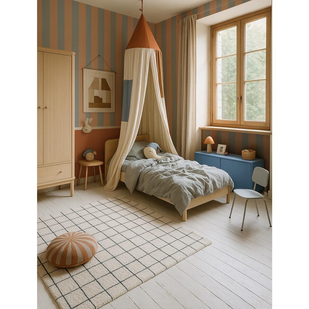 1. Children's room with blue and cappuccino striped wallpaper, featuring a canopy bed, wooden furniture, and a checkered rug, creating a cozy and stylish interior