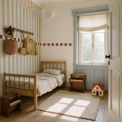 1. Children's room with blue and beige striped wallpaper by Dekornik, featuring wooden bed and toys, natural light from window
