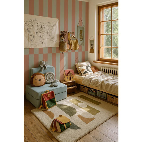 1. Children's room with Dekornik stripes wallpaper in muted green and cappuccino, featuring a cozy bed, toys, and a large window with natural light