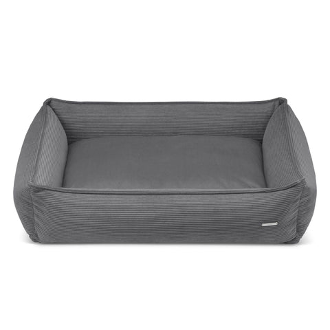 2. Dark grey corduroy dog bed by Labbvenn with suede-like cushion, shown in studio setting highlighting texture and structure