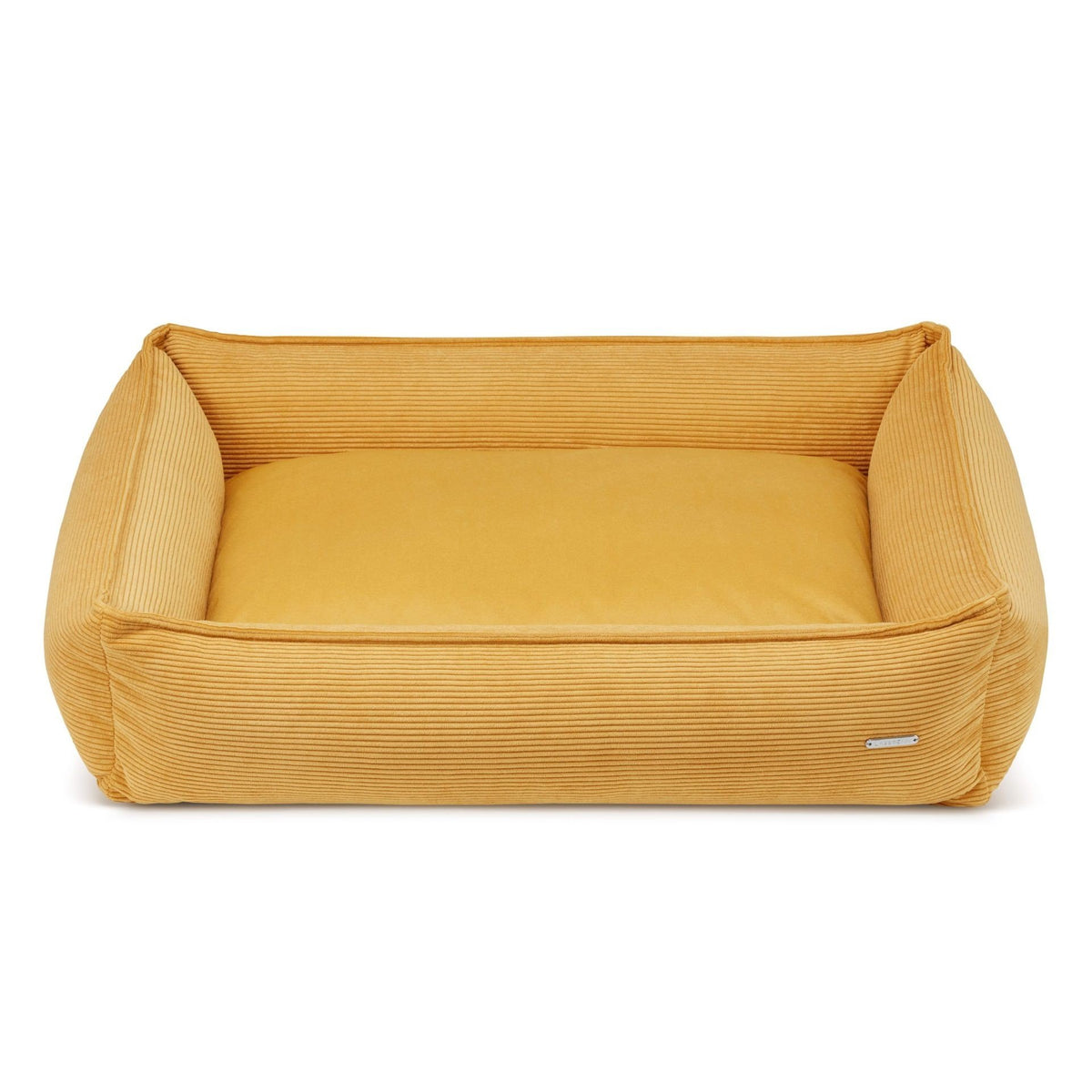2. Honey-colored corduroy dog bed by Labbvenn shown in studio setting, highlighting its rectangular shape and smooth suede-like cushion.