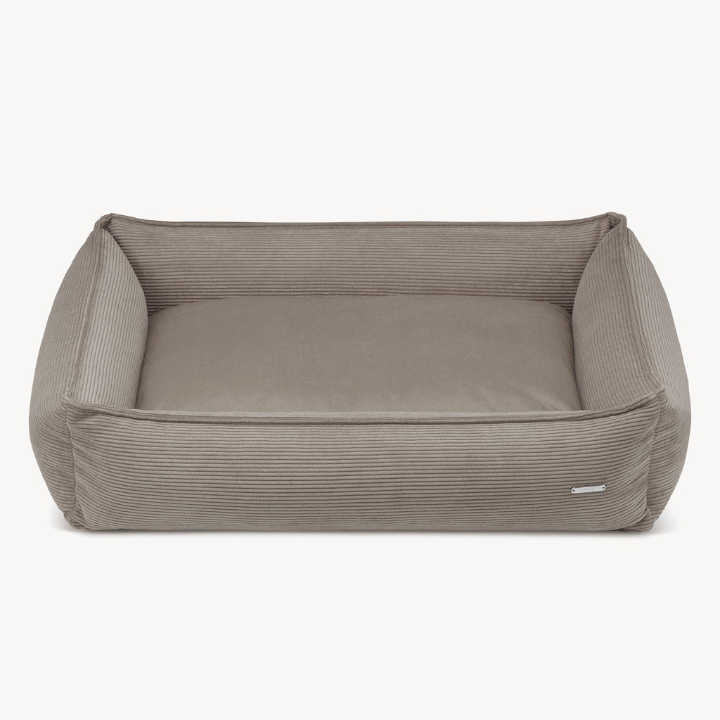 2. Studio shot of Labbvenn Strippo dog bed in Mokka color, featuring corduroy fabric and suede-like cushion, shown on a clean white background