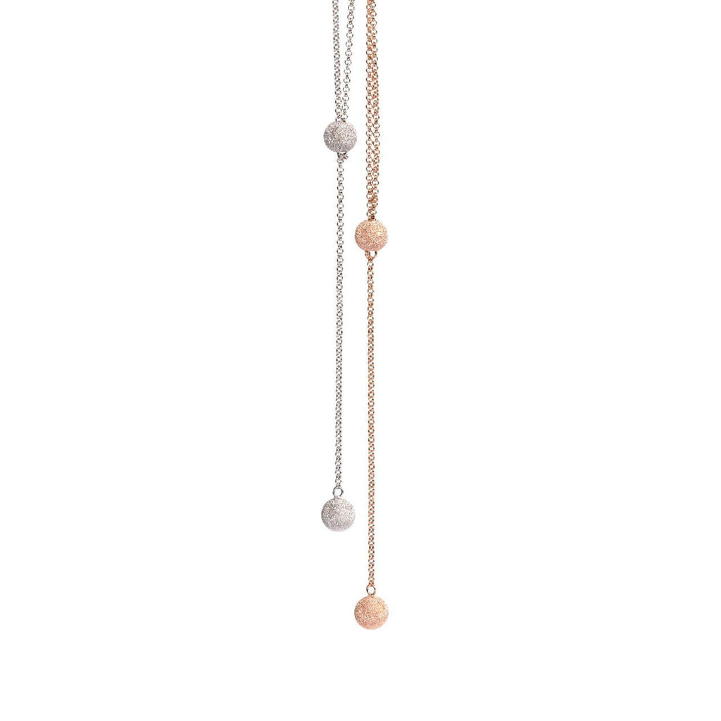 4. Close-up of MyaMoon Sugarball Necklaces in rose gold and silver rhodium, showing sugarball pendants