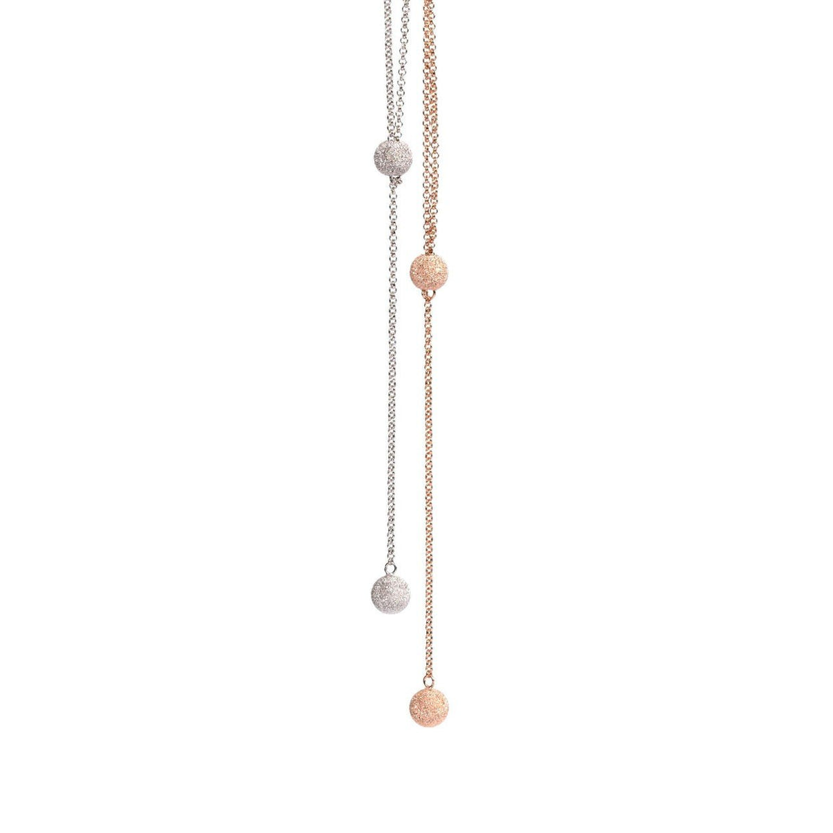 4. Close-up of MyaMoon Sugarball Necklaces in rose gold and silver rhodium, showing sugarball pendants
