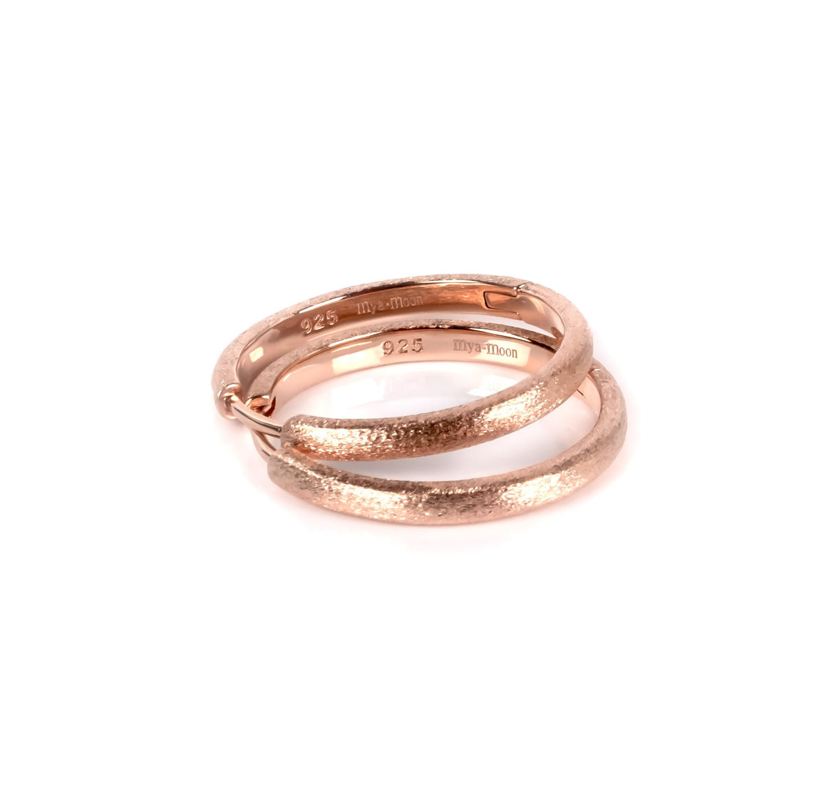 2. Rose gold Sugar Hoops earrings by MyaMoon with brushed surface and polished inside, made of 925 silver, shown in studio lighting